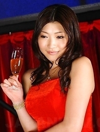 Karin Kusunoki poses in red dress