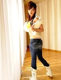 Emiri Seo poses in a room on floor