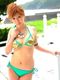 Cute Japanese babe poses outdoor