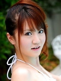 Lovely Japanese babe enjoys posing