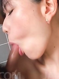 Manami Komukai Asian shows hot curves and sucks tool in bathtub