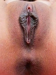 Ibuki in a red chair legs spread with a toy stuffed deep