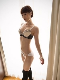 Mizuki poses in her lingerie in a sun-lit room before stripping naked for you