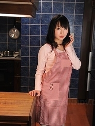 This Asian housewife Nozomi Hazuki poses in