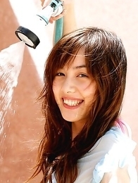 Rola Chen plays with outdoor shower on body over lingerie