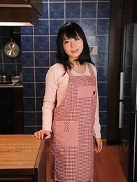 This Asian housewife Nozomi Hazuki poses in