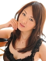 Machimura Sayoko shows big boobs in black
