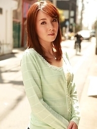 Chika Sasaki in green sweater and short skirt