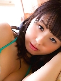 Rina Koike in socks and colorful bath suit is so playful