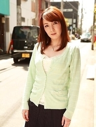 Chika Sasaki in green sweater and short skirt