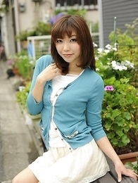 Juri Kitahara in blue sweater and lace skirt