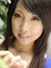 Asian Chihiro Kitagawa poses in dress outdoor