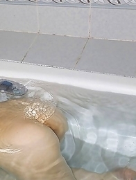 Rin Hitomi shows nasty ass and spoils fresh tits with water