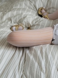 Hottie in white Sena Sakura shows off her perfect body on a big white bed