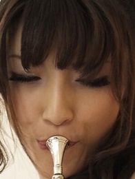 A fan fucks Kanako Iioka with his fingers while playing the horn