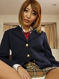 Miina Minamoto wears her uniform as two men explore her body