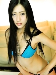 Mitsu Dan with long beautiful hair shows curves in lingerie