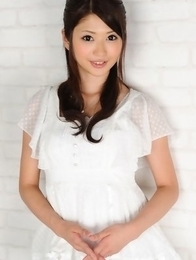 Hitomi Nose is playful doll in short jeans and high heels