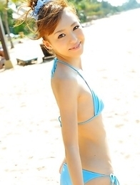 Aino Kishi in blue bath suit is a true beauty enjoying sand