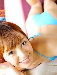 Aino Kishi in blue bath suit is a true beauty enjoying sand