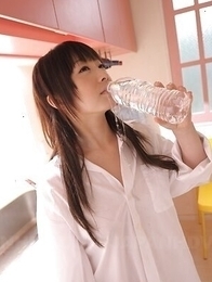 Miku Tamaru in white shirt shows big tits and enjoys drinking water.
