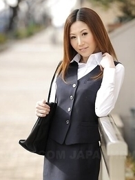 Rei Haruka spreads her legs and reveals shaved pussy in her office