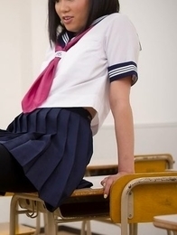 Schoolgirl Uta Kohaku gives a stunning footjob to her horny-ass teacher