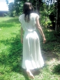 Neo babe in white dress loves feeling her body in water