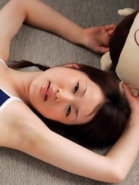 Naoko Sawano in swimsuit puts pillow between her sexy legs