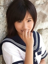 Japan teen Yuzuki Hashimoto in sailor gal uniform is playful outdoor