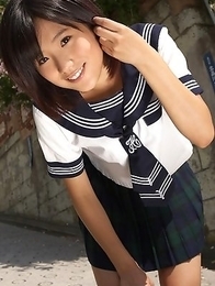 Japan teen Yuzuki Hashimoto in sailor gal uniform is playful outdoor