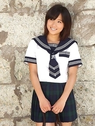 Japan teen Yuzuki Hashimoto in sailor gal uniform is playful outdoor