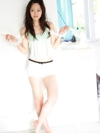 Airi Suzuki in cute bath suit enjoys hot sand on her curves