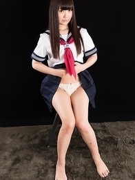 Schoolgirl seductress Aino Neko casually jerking a cock with her soft feet