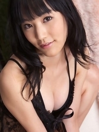 Yuri Hamada spreads legs and shows slit in black bikini