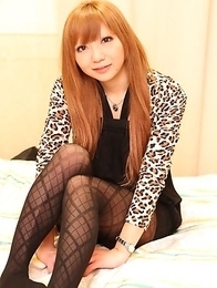 Minami Itao taking her clothes off to show her nice titties and play with her hairy pussy