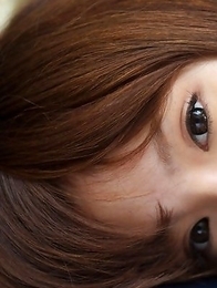 Manami Sato in short uniform skirt spends time in the park