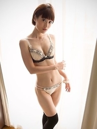 Mizuki poses in her lingerie in a sun-lit room before stripping naked for you